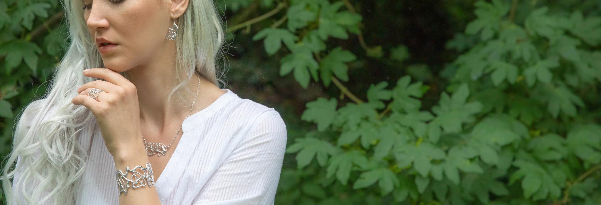 Model wearing the Silver Molten Metal collection from Maggie Read Jewellery