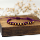 Maggie Read Jewellery Rings Metal beads Beaded Woven Bracelet - Purple & Gold